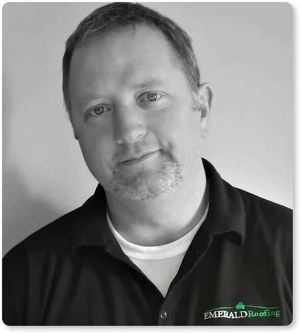 black and white image of a man with a polo on